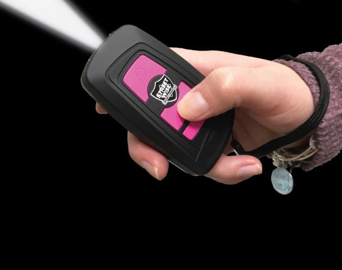 Pocket stun gun, keychain for pranks, in the form of car keys or a